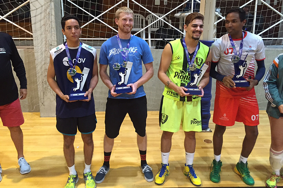 Junior Jake Reed (second from left) earned most valuable player honors during a recent trip to Brazil as part of a USA Division III volleyball team
