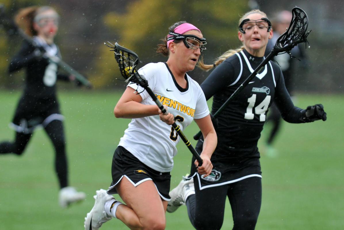 Paradis Re-Writes Record Book as Women's Lacrosse Picks up First Win
