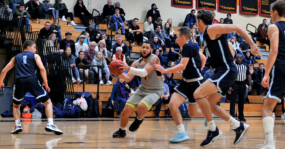 Nor'Easters Fend off Men's Basketball